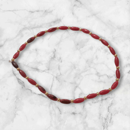 دستبند مهره کشی قرمز و طلایی دست ساز