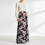 دامن بلند ای لاین کمرکش گل لیلیوم با زمینه مشکی کرپ نخ پفکی قد 100cm سایز 32 تا 62 رویداسما roydasma سایز بزرگ موجود